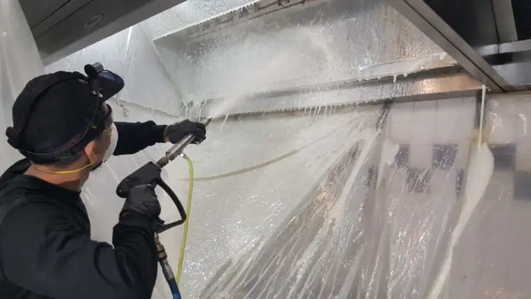 team-member-cleaning-kitchen-exhaust-