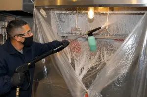 Certified kitchen exhaust cleaning technician